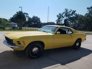 yellow classic car in Wildwood, FL